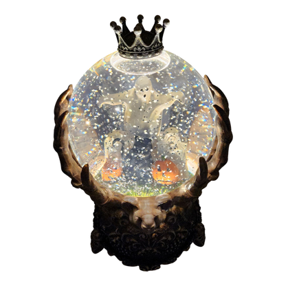 Spooky Spinning Waterglobe held by Skeleton Hands