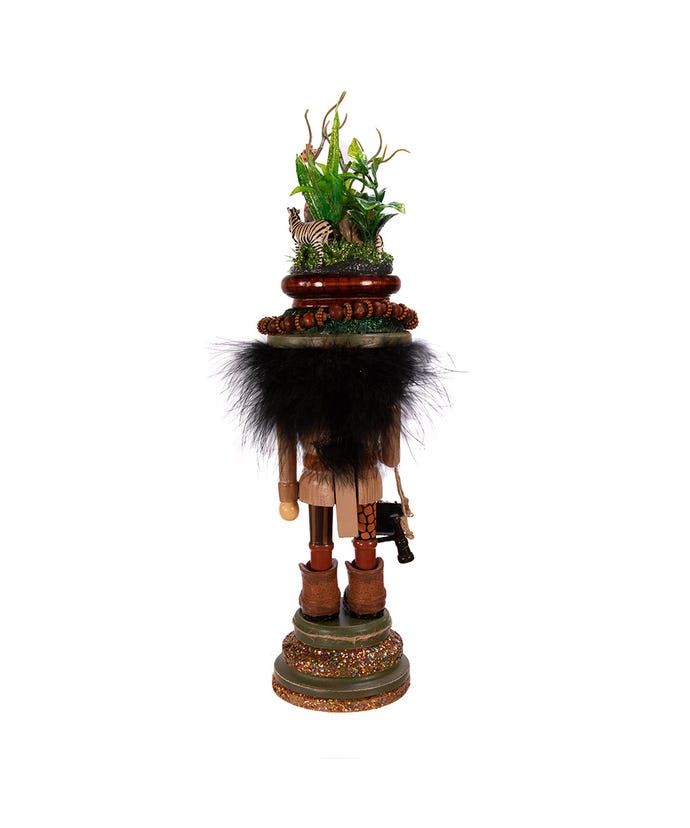Decorative nutcracker with a natural scene on a white background